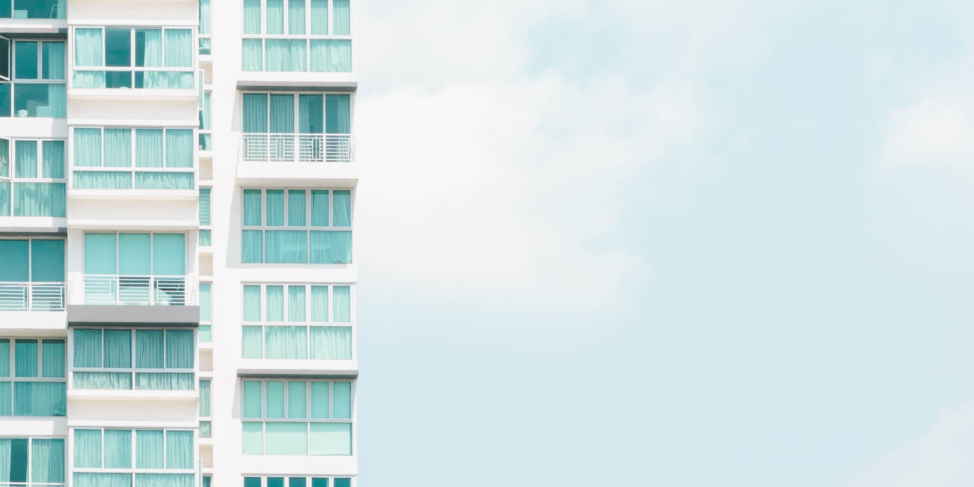 apartment building with blue sky